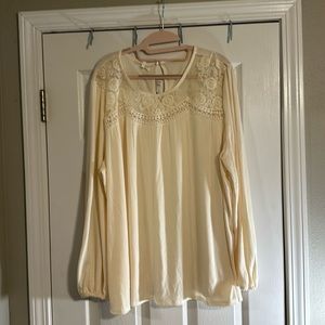 Long sleeve causal shirt with a bit of lace and crochet at the neckline